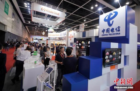 资料图：中国电信展台。/p中新社记者 张炜 摄